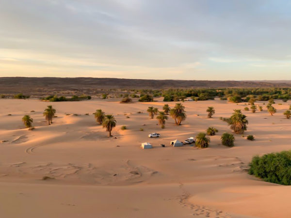 A caravan site is see from atop the big dunes of Azouega